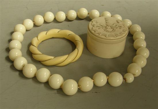 Appraisal: Ivory dressing table round box diameter a string of white