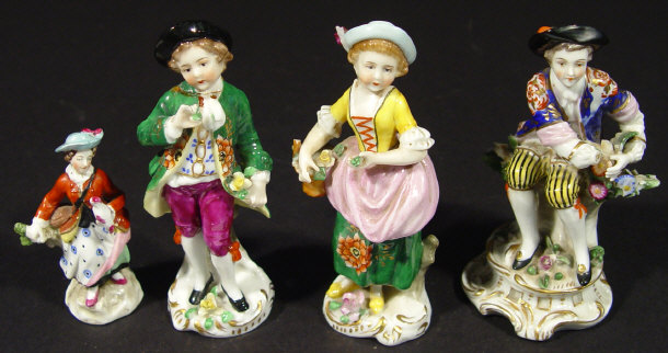 Appraisal: Four th Century Derby style porcelain figures each hand painted