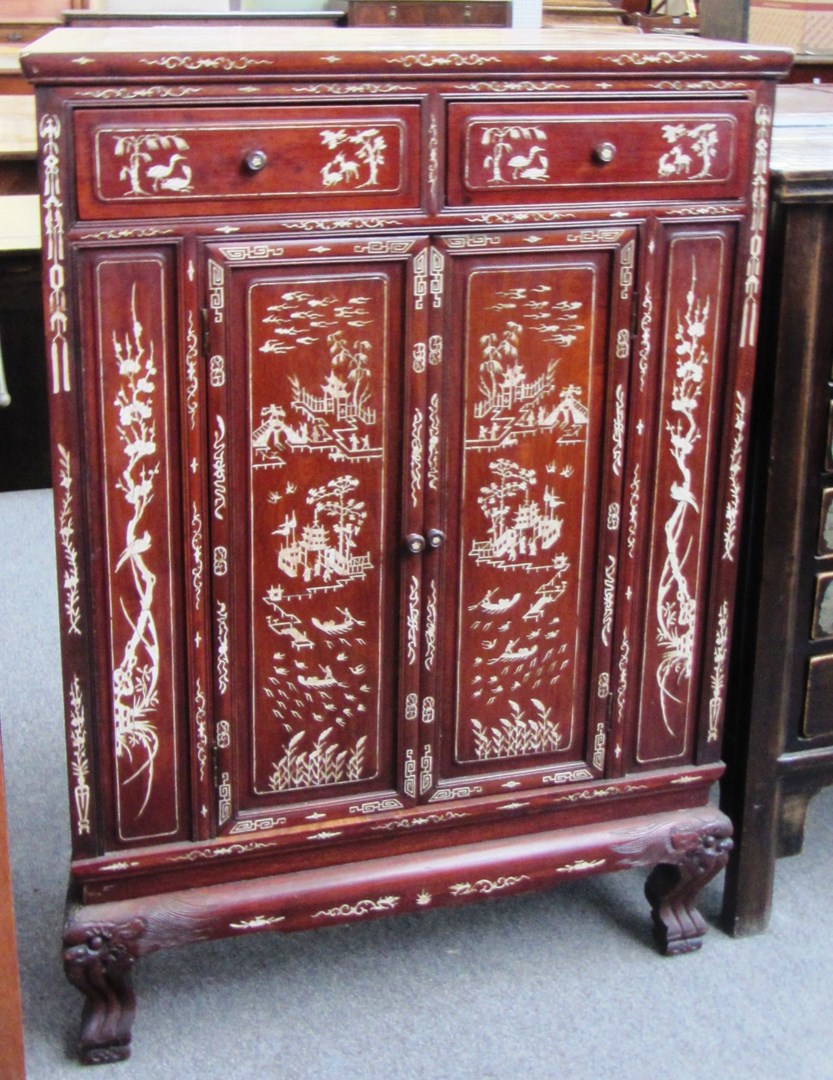 Appraisal: An early th century Chinese bone inlaid hardwood side cabinet