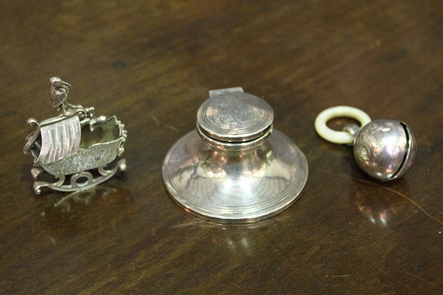 Appraisal: A SILVER CAPSTAN INKWELL monogrammed Birmingham together with a silver