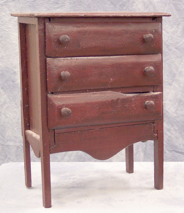 Appraisal: Miniature drawer pine chest in old red painted surface w