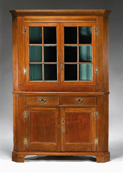 Appraisal: Cherry corner cupboard pennsylvania In two parts the cove molded