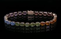 Appraisal: Bracelet set with Rainbow Semi-Precious Stones This bracelet is comprised