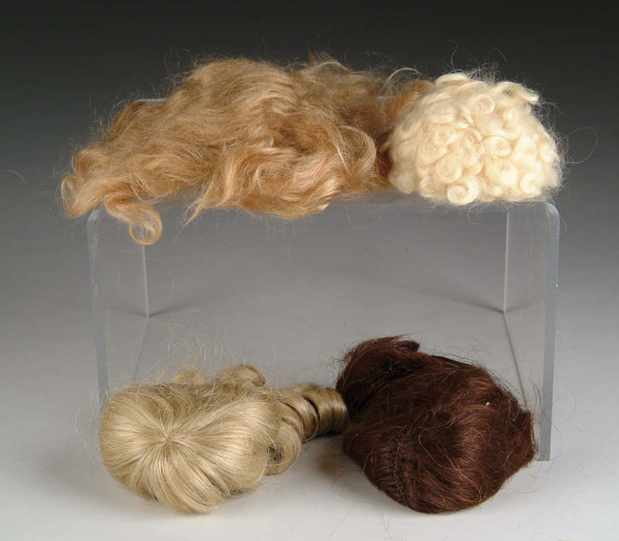 Appraisal: LOT OF NEWER WIGS Twenty-five plus wigs some mohair and