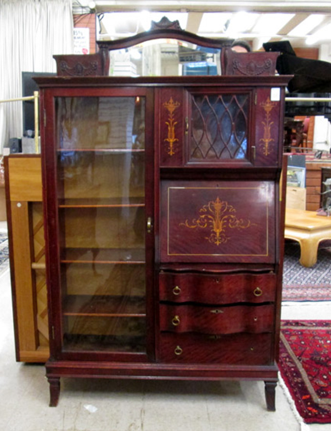 Appraisal: LATE VICTORIAN INLAID MAHOGANY SECRETARY BOOKCASE American c the left