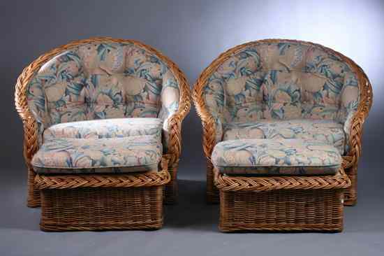 Appraisal: PAIR WOVEN RATTAN CLUB CHAIRS WITH OTTOMANS by Wicker Works