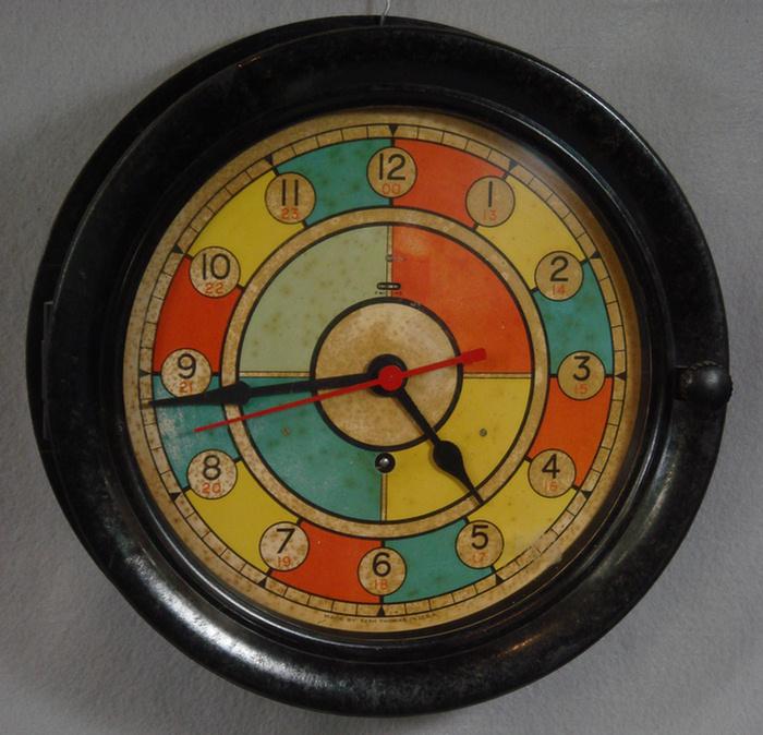 Appraisal: Seth Thomas radio room clock black bakelite case multi-colored dial