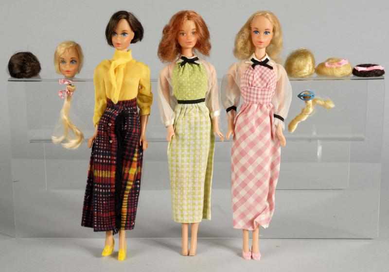 Appraisal: Quick Curl Hair Fair Barbie Dolls Description Group of dolls