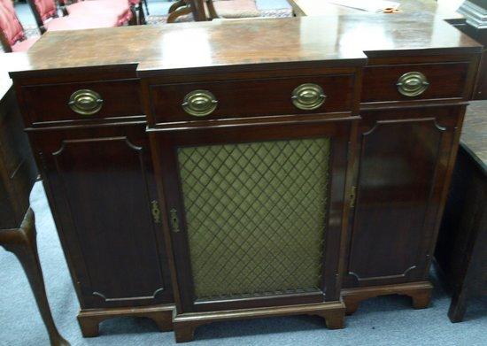 Appraisal: A mahogany breakfront dwarf bookcase of Regency design fitted three