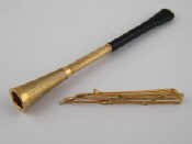 Appraisal: A carat gold and ebonised wood extending cigarette holder cm