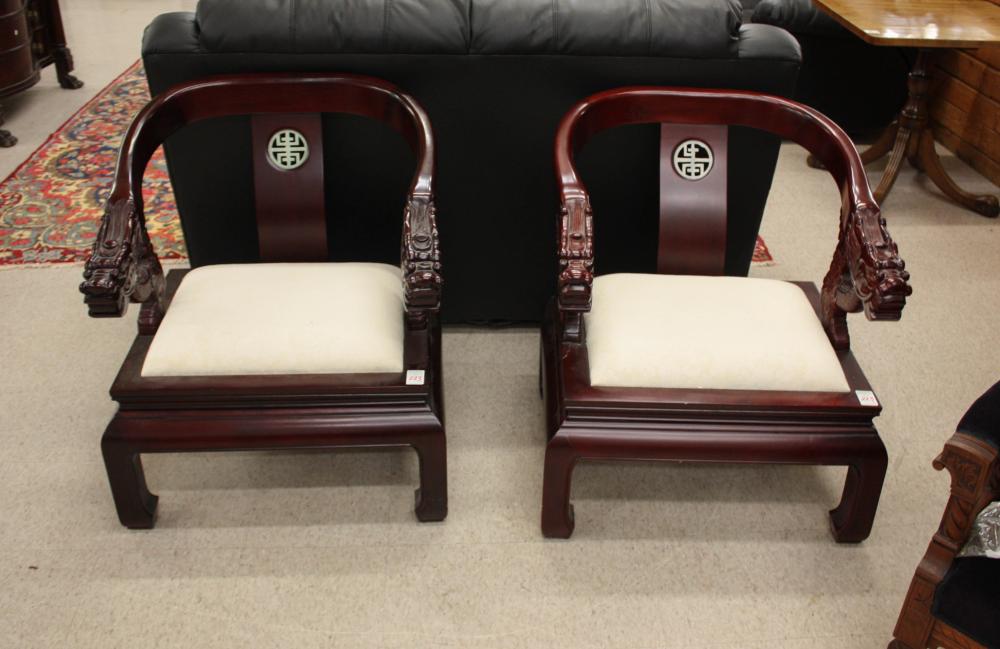 Appraisal: PAIR OF CHINESE DRAGON ARMCHAIRS late th century with inset