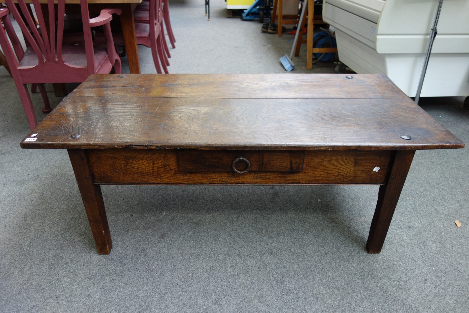 Appraisal: An early th century French oak coffee table reduced from