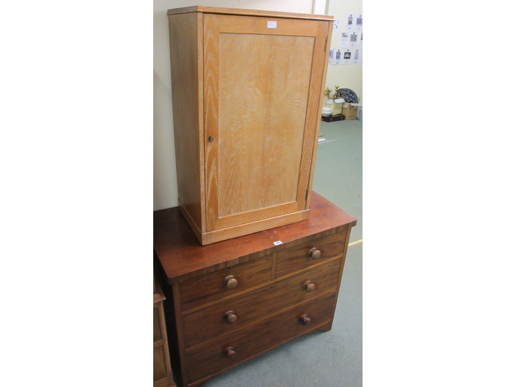 Appraisal: A Victorian mahogany chest and oak cabinet