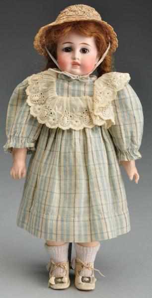 Appraisal: Early Doll with Bru Style Face Description German bisque socket