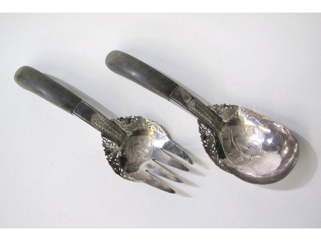 Appraisal: Pair of Eastern white metal servers