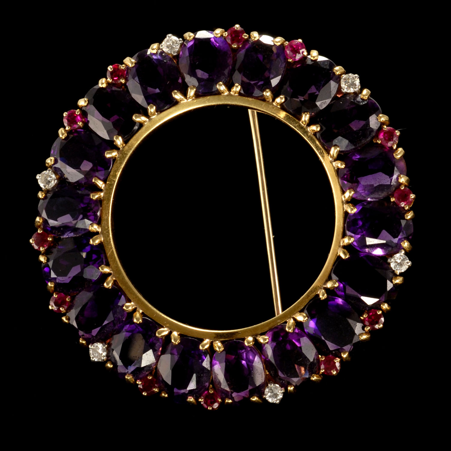 Appraisal: KT GOLD AND AMETHYST CIRCULAR BROOCH BY RAYMOND C YARD