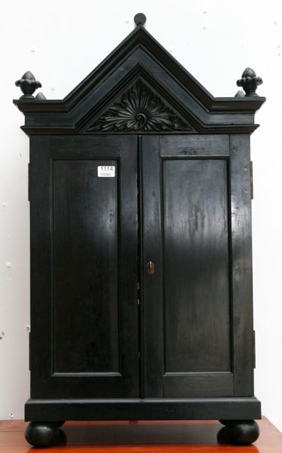 Appraisal: An ebony jewellery cabinet