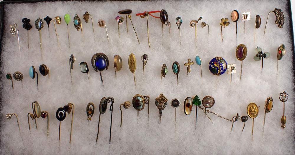 Appraisal: ANTIQUE AND VINTAGE STICK PIN COLLECTION displayed in rectangular display