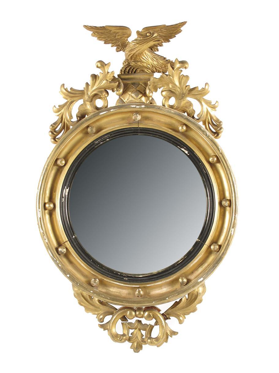 Appraisal: A Regency style giltwood and gesso convex wall mirror