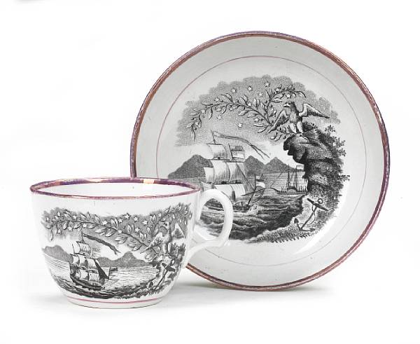 Appraisal: An English transfer printed lustreware commemorative cup and saucer of