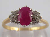 Appraisal: A yellow metal tests carat gold ruby and diamond ring