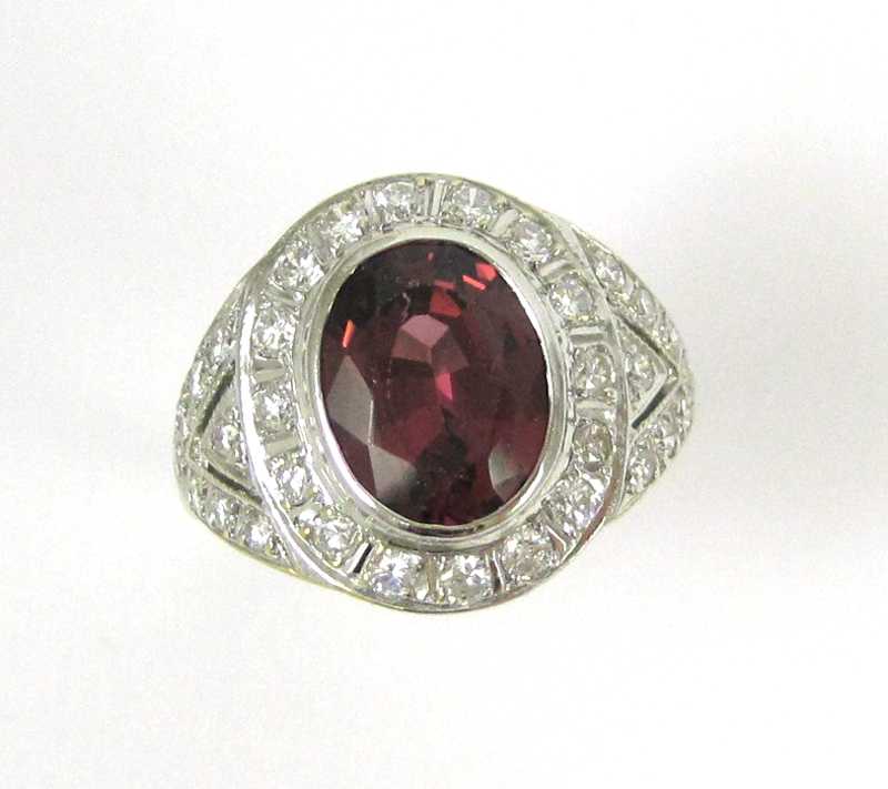 Appraisal: SPINEL DIAMOND AND FOURTEEN KARAT GOLD RING The white gold