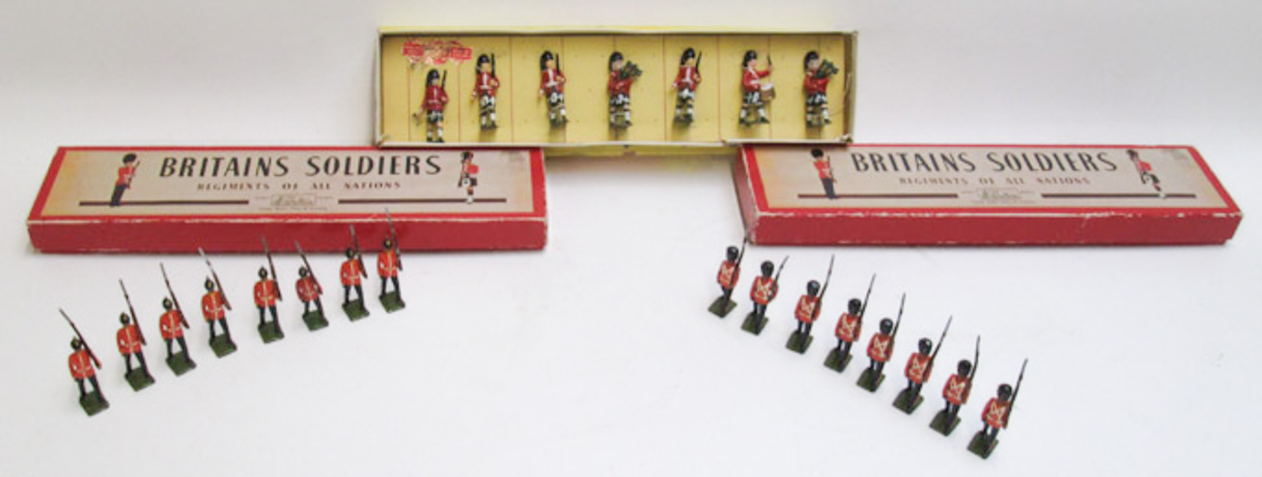 Appraisal: THREE SETS OF TOY SOLDIERS including eight Royal Fusilers in