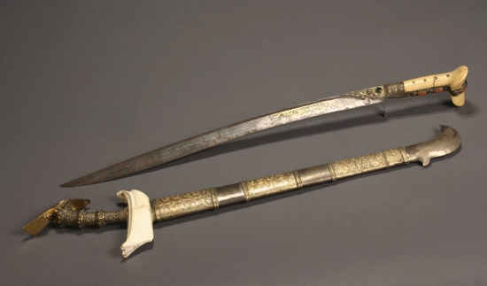 Appraisal: Indonesian Ivory and Gilt Metal-Hilted Kris with Scabbard and an