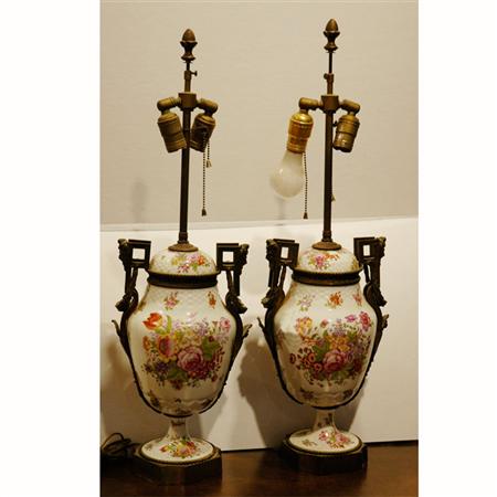 Appraisal: Pair Continental Transfer Decorated Gilt-Metal Mounted Porcelain Lamps Estimate -