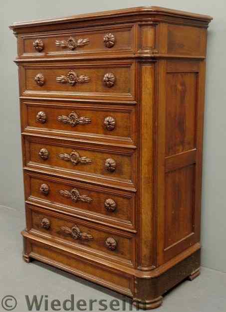 Appraisal: Victorian carved walnut high chest with carved escutcheons Matches Lots