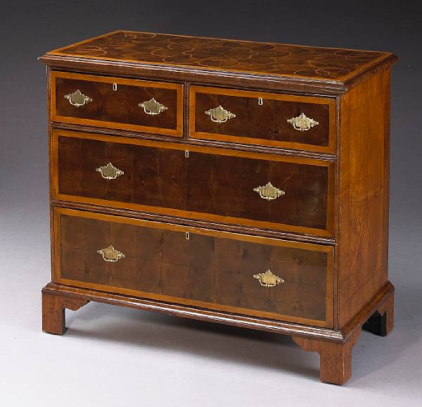 Appraisal: A Queen Anne oyster veneered chest of drawers The crossbanded