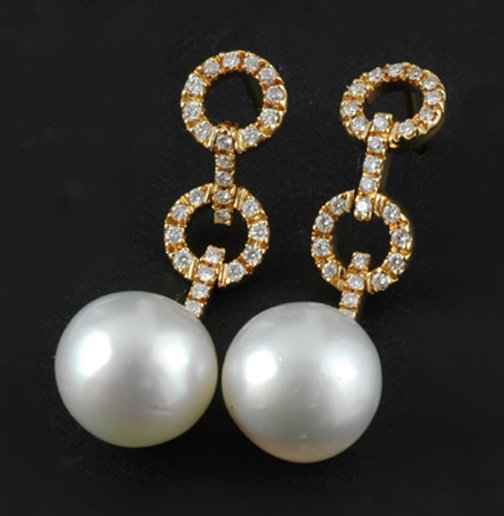 Appraisal: A pair of South Sea pearl and diamond earrings by