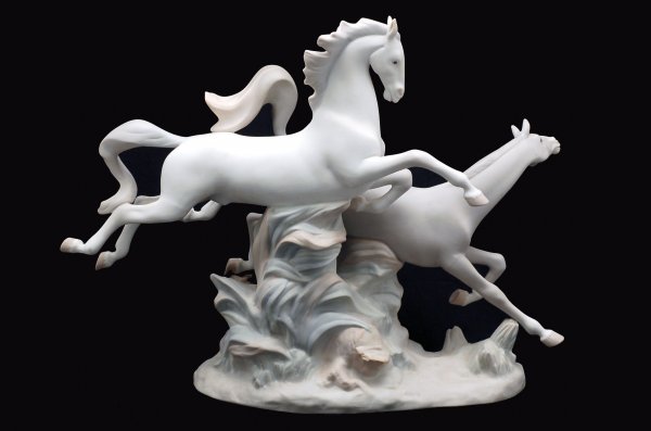 Appraisal: Lladro figurine of two running horses marked Lladro Hand Made