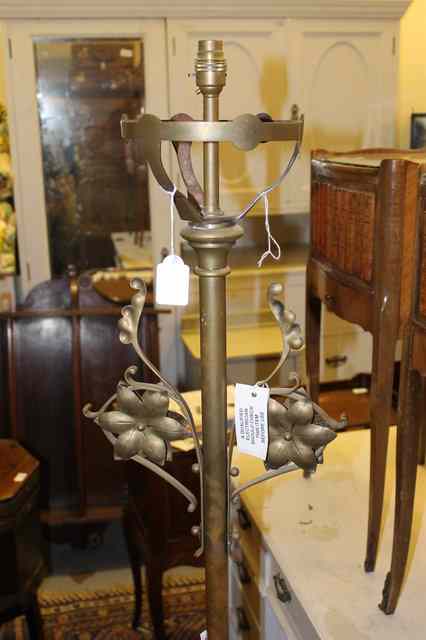 Appraisal: A VICTORIAN BRASS AESTHETIC LAMP STANDARD with flower head decoration