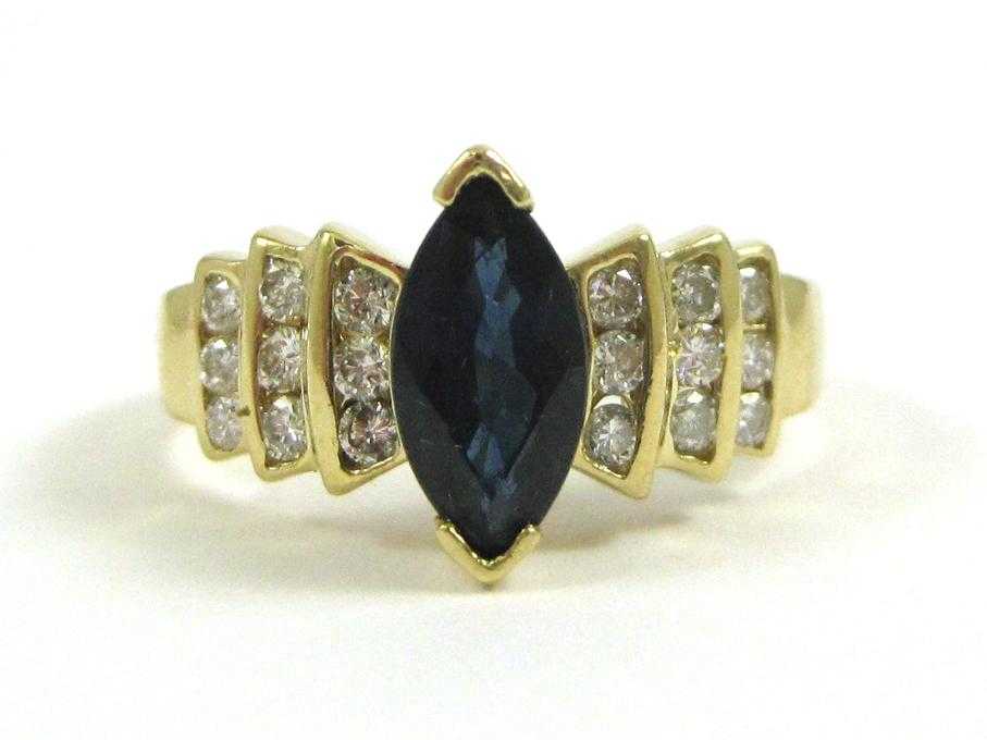 Appraisal: SAPPHIRE DIAMOND AND FOURTEEN KARAT GOLD RING with nine round-cut