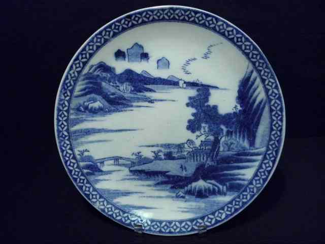 Appraisal: th century Arita round blue and white charger Landscape scene