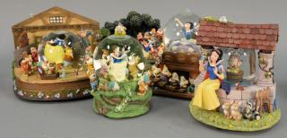 Appraisal: Group of five Disney snow globes music boxes Snow White