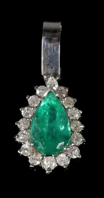 Appraisal: Pear-shape natural emerald weighing carats Surrounded by diamonds about carats