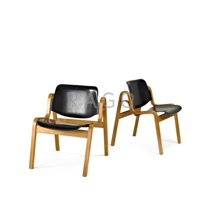 Appraisal: ILMARI TAPIOVAARA SCHAUMAN Pair of Wilhelmina molded plywood stacking chairs