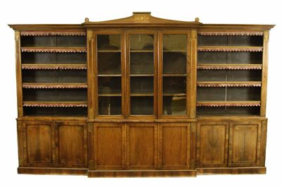 Appraisal: An early th century rosewood and brass inlaid breakfront bookcase