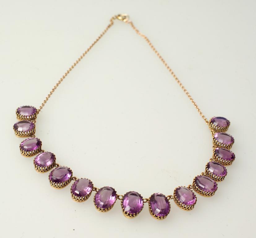 Appraisal: AMETHYST NECKLACE EARLY th CENTURY the fifteen oval graduated stones