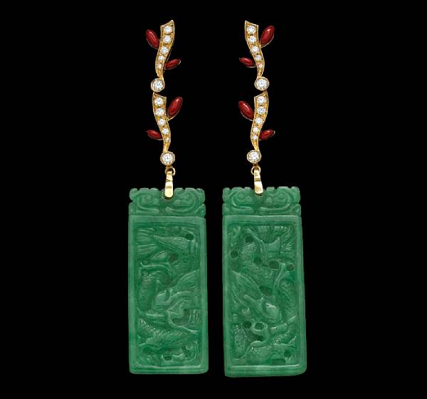 Appraisal: A pair of carved jadeite jade diamond and red enamel