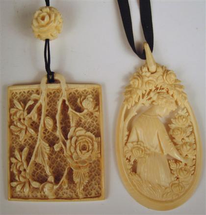 Appraisal: Two Ivory pendantsOne European toge Ther with a Chinese square