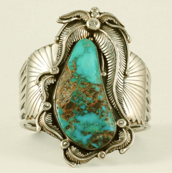 Appraisal: Large Navajo cuff bracelet centered around a large piece of