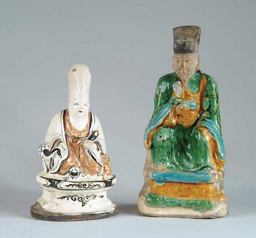 Appraisal: TWO ORIENTAL POTTERY FIGURES - h seated figure with tall