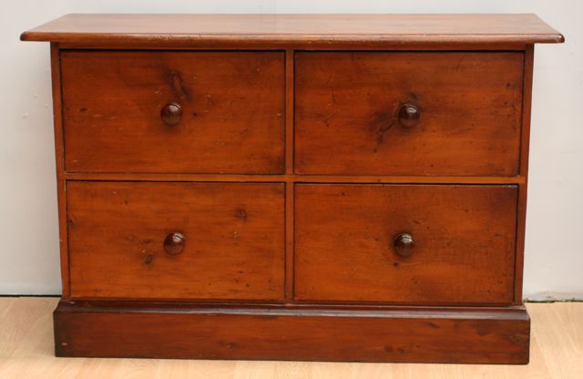 Appraisal: An early th century stained pine chest of four drawers