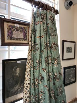 Appraisal: Two pairs of curtains decorated with birds insects and flowers