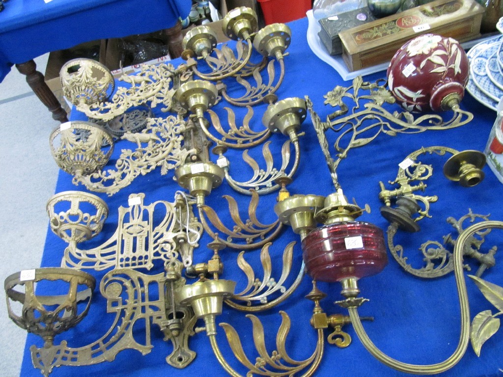 Appraisal: Sixteen gilt metal wall light brackets to include a set