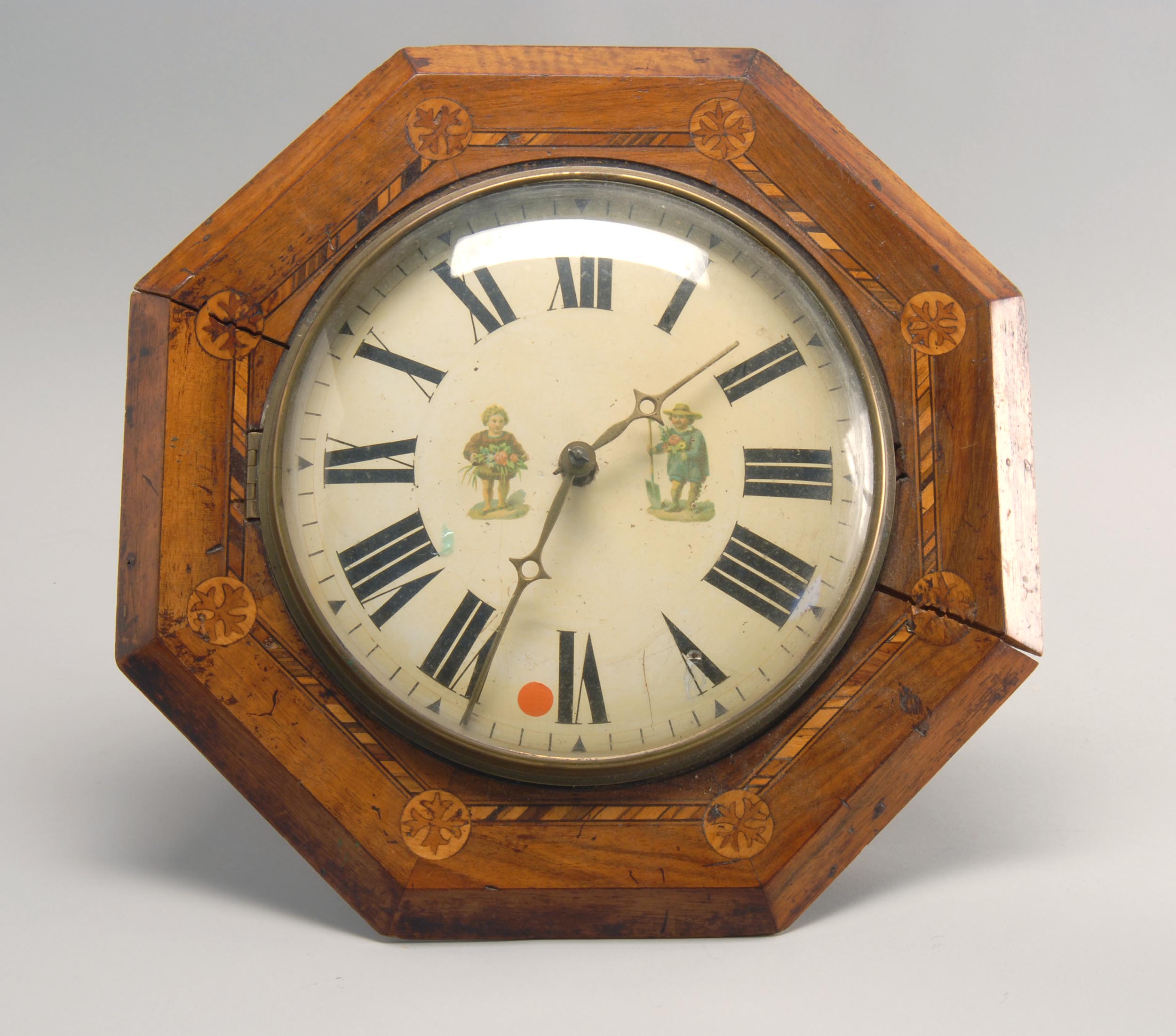 Appraisal: LATE TH CENTURY WAG-ON-THE-WALL CLOCK with marquetry inlay and figural-decorated