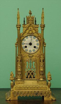 Appraisal: LOUIS-PHILIPPE GILT-BRONZE CATHEDRAL MANTEL CLOCK The later dial in architectural